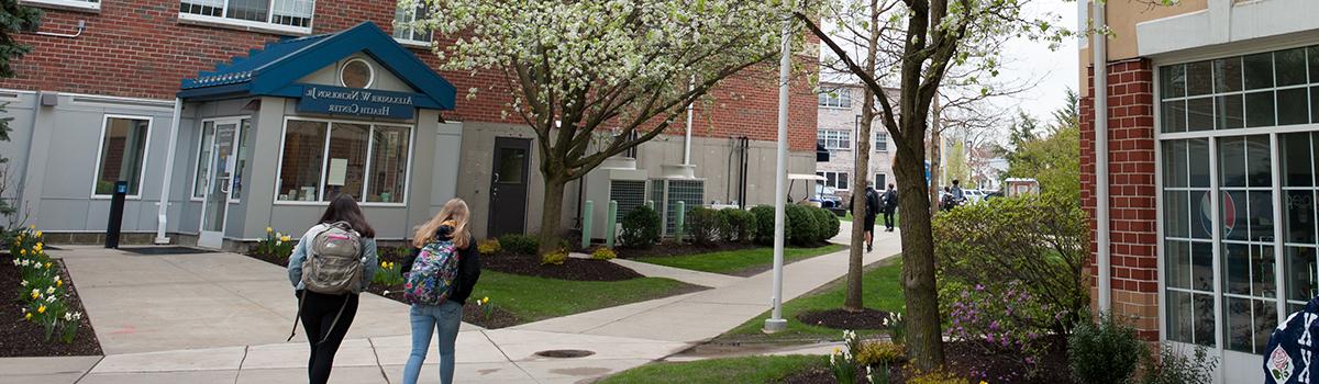 Students walking near Nicholson Health Center